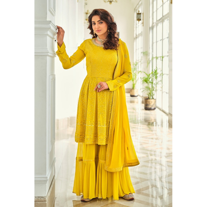 Attractive Yellow Gharara Style Embroidered Peplum Suit