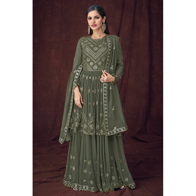 Fancy Fabric Green Peplum Style Designer Lehenga Suit