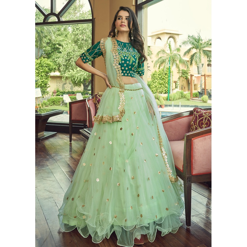 Glamorous Pista Green Heavy Net Party Wear Lehenga Choli