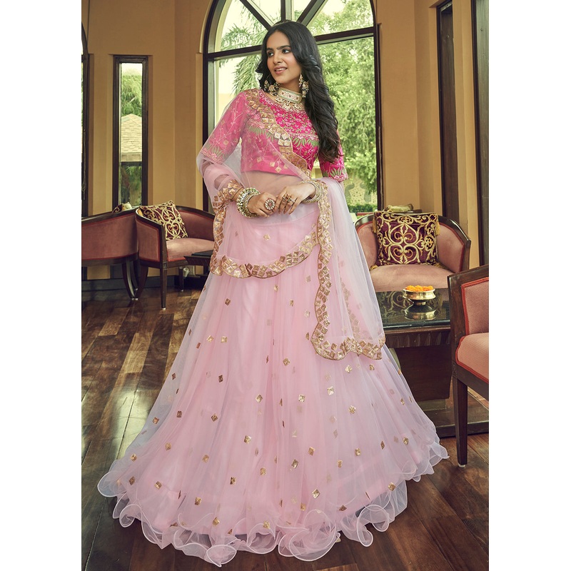 Impressive Baby Pink Heavy Net Party Wear Lehenga Choli