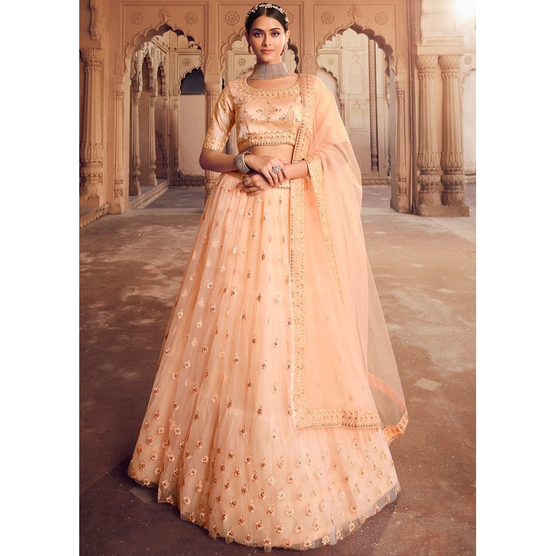 Wondrous Light Orange Tiered Heavy Lehenga Choli