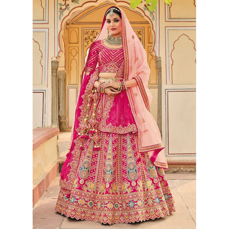 Enticing Pink Bridal Wear Heavy Embroidered Silk Lehenga Choli
