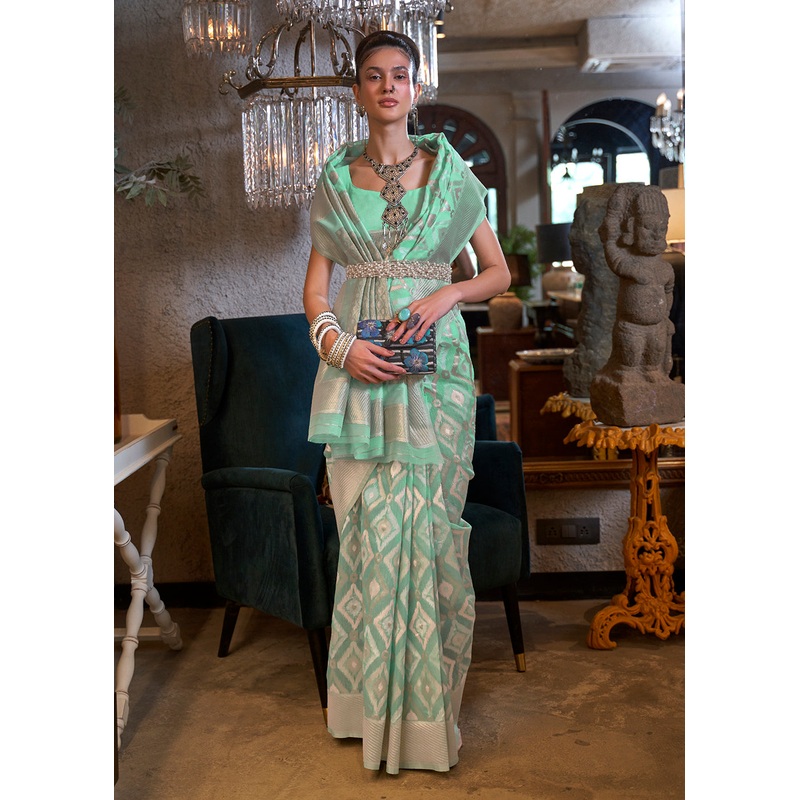 Fascinating Mint Green Zari Weaving Linen Designer Saree