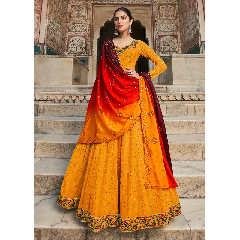 Fascinating Yellow Sequins Georgette Party Wear Festive Gown